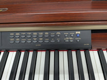 Load image into Gallery viewer, YAMAHA CLAVINOVA CLP-270 DIGITAL PIANO AND STOOL IN MAHOGANY FINISH stock #25347

