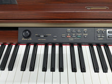 Load image into Gallery viewer, YAMAHA CLAVINOVA CLP-270 DIGITAL PIANO AND STOOL IN MAHOGANY FINISH stock #25347
