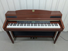 Load image into Gallery viewer, YAMAHA CLAVINOVA CLP-270 DIGITAL PIANO AND STOOL IN MAHOGANY FINISH stock #25347

