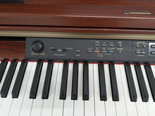 Load image into Gallery viewer, YAMAHA CLAVINOVA CLP-270 DIGITAL PIANO IN MAHOGANY FINISH stock #25356
