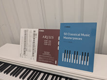 Load image into Gallery viewer, Yamaha Arius YDP-144 digital piano and stool in satin white stock nr 25376
