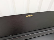 Load image into Gallery viewer, Casio Celviano AP-270 digital piano in satin black finish stock #25382
