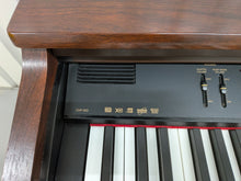 Load image into Gallery viewer, Yamaha Clavinova CVP-103 Digital Piano and stool in mahogany stock nr 25386
