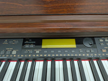 Load image into Gallery viewer, Yamaha Clavinova CVP-103 Digital Piano and stool in mahogany stock nr 25386
