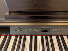 Load image into Gallery viewer, Yamaha Clavinova CLP-130 Digital Piano and stool in dark rosewood stock #25384
