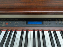 Load image into Gallery viewer, Yamaha Clavinova CLP-970 Digital Piano and stool in mahogany stock nr 25385
