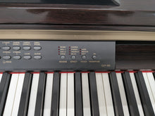 Load image into Gallery viewer, Yamaha Clavinova CLP-120 Digital Piano in dark rosewood stock #25405
