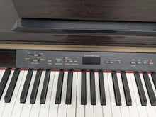 Load image into Gallery viewer, Yamaha Clavinova CLP-120 Digital Piano in dark rosewood stock #25405
