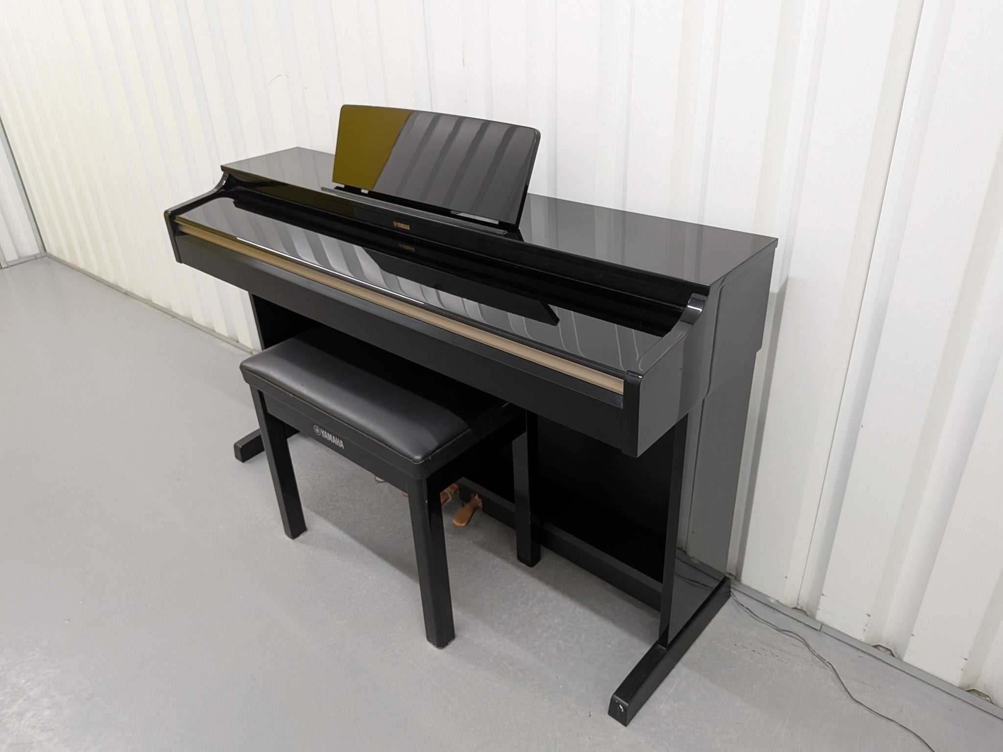 Yamaha Arius YDP-162 Digital Piano and stool in glossy black