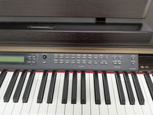 Load image into Gallery viewer, Yamaha Clavinova CLP-150 digital piano and stool in dark rosewood stock #25409
