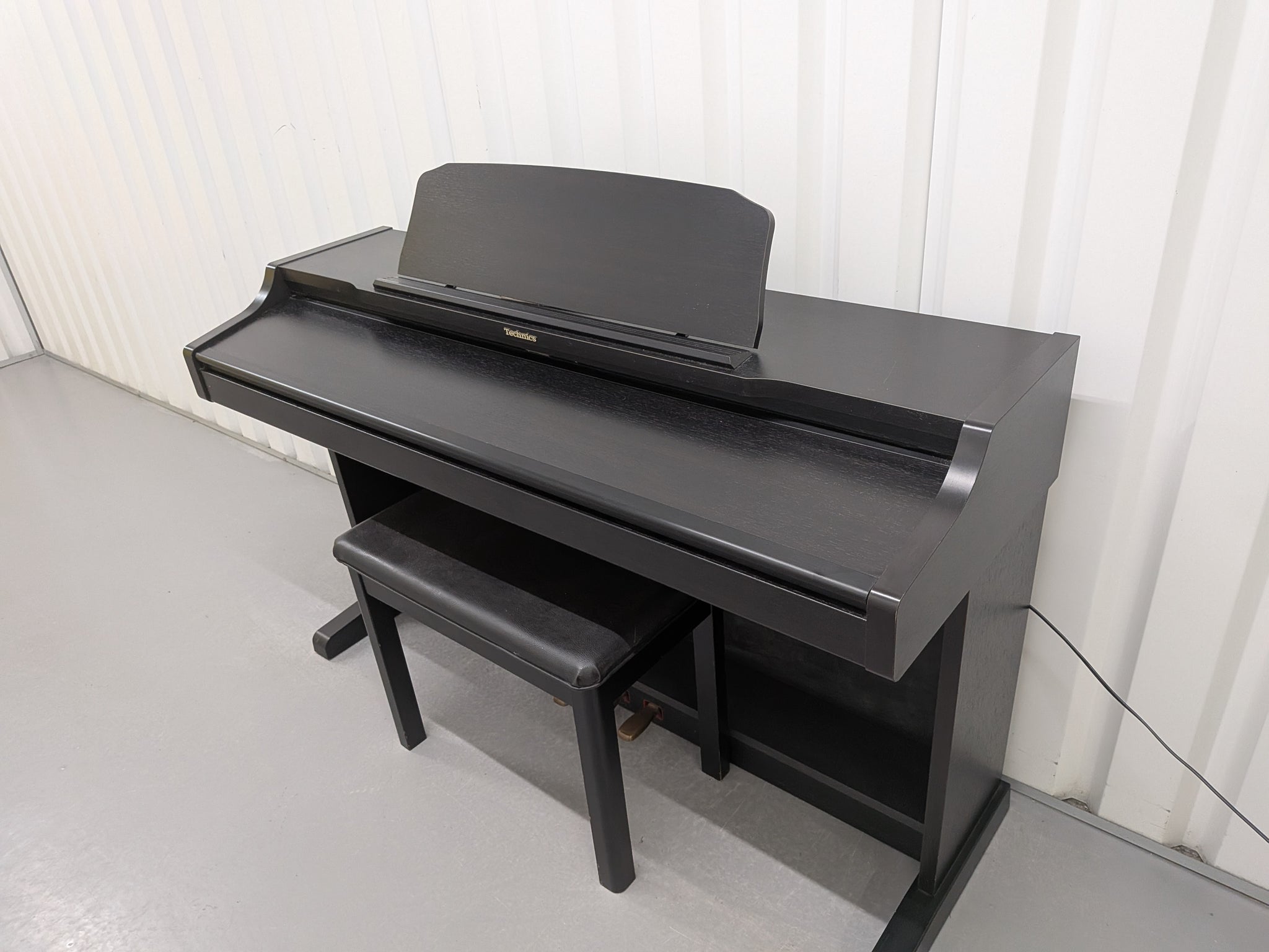 TECHNICS SX-PX552 DIGITAL PIANO AND STOOL IN SATING BLACK stock