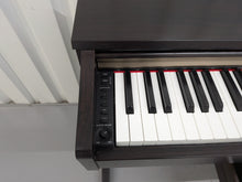 Load image into Gallery viewer, Yamaha Clavinova CLP-320 Digital Piano and stool in dark rosewood stock #25417
