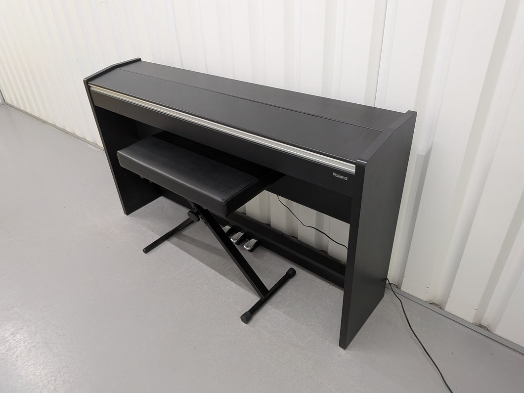 Roland F130R compact slim size Digital Piano and stool in black  stock # 25413