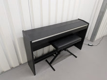 Load image into Gallery viewer, Roland F130R compact slim size Digital Piano and stool in black  stock # 25413
