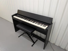 Load image into Gallery viewer, Roland F130R compact slim size Digital Piano and stool in black  stock # 25413
