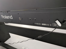 Load image into Gallery viewer, Roland F130R compact slim size Digital Piano and stool in black  stock # 25413
