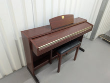 Load image into Gallery viewer, Yamaha Clavinova CLP-220 digital piano and stool in mahogany stock #25427
