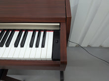 Load image into Gallery viewer, Yamaha Clavinova CLP-220 digital piano and stool in mahogany stock #25427
