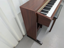 Load image into Gallery viewer, Yamaha Clavinova CLP-220 digital piano and stool in mahogany stock #25427
