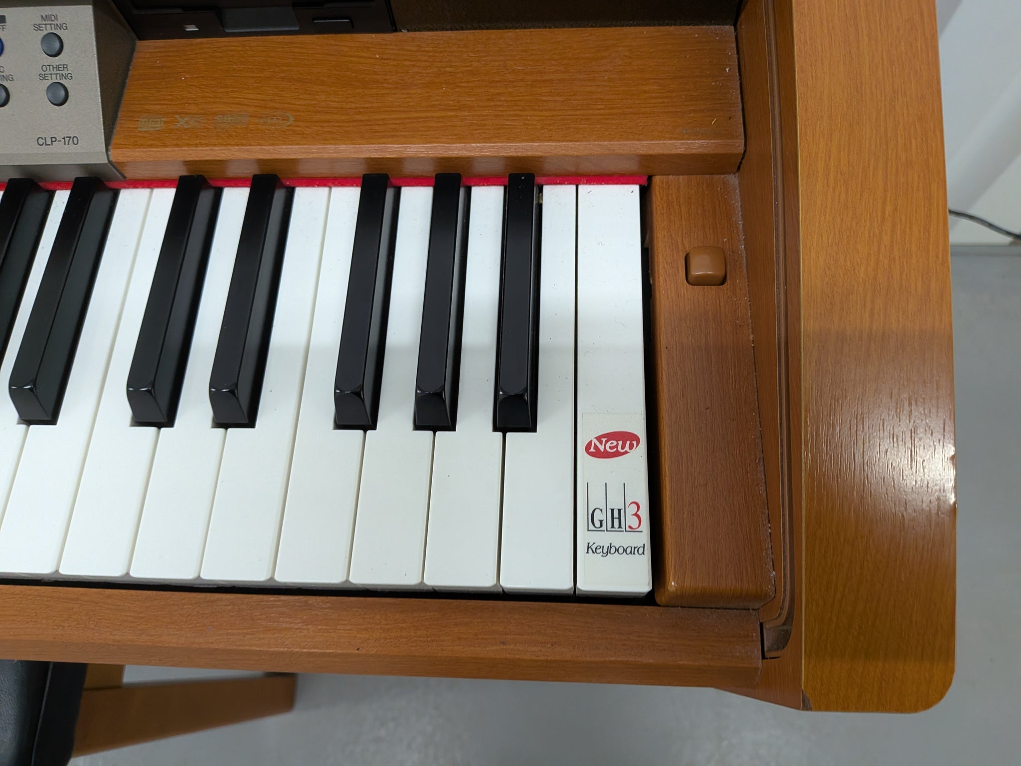 Yamaha Clavinova CLP-170 digital piano and stool in cherry wood