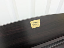 Load image into Gallery viewer, Yamaha Clavinova CLP-320 Digital Piano in dark rosewood stock #25420
