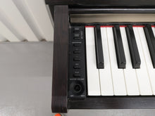 Load image into Gallery viewer, Yamaha Clavinova CLP-320 Digital Piano in dark rosewood stock #25420
