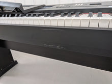Load image into Gallery viewer, Yamaha DGX-650 in black 88 Weighted Keys Portable Grand stock #25435
