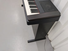 Load image into Gallery viewer, Yamaha DGX-650 in black 88 Weighted Keys Portable Grand stock #25441
