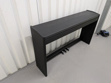 Load image into Gallery viewer, Roland F107 compact slim size Digital Bluetooth Piano in black  stock # 25455
