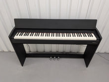 Load image into Gallery viewer, Roland F107 compact slim size Digital Bluetooth Piano in black  stock # 25455
