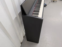 Load image into Gallery viewer, Roland F107 compact slim size Digital Bluetooth Piano in black  stock # 25455
