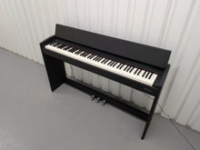Load image into Gallery viewer, Roland F107 compact slim size Digital Bluetooth Piano in black  stock # 25455
