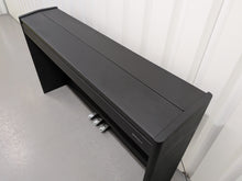 Load image into Gallery viewer, Roland F107 compact slim size Digital Bluetooth Piano in black  stock # 25455
