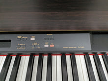 Load image into Gallery viewer, YAMAHA CLAVINOVA CLP-880 high end Digital Piano in rosewood Stock nr 25454
