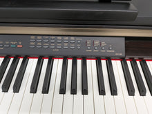 Load image into Gallery viewer, Yamaha Clavinova CLP-130 Digital Piano and stool in black stock #25457
