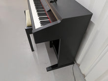 Load image into Gallery viewer, Yamaha Clavinova CLP-130 Digital Piano and stool in black stock #25457
