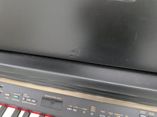 Load image into Gallery viewer, Yamaha Clavinova CLP-130 Digital Piano and stool in black stock #25457
