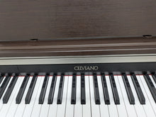 Load image into Gallery viewer, CASIO CELVIANO AP-220 DIGITAL PIANO AND STOOL IN DARK ROSEWOOD stock #25479
