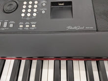 Load image into Gallery viewer, Yamaha DGX-650 in black 88 Weighted Keys Portable Grand 3 pedals stock #25480
