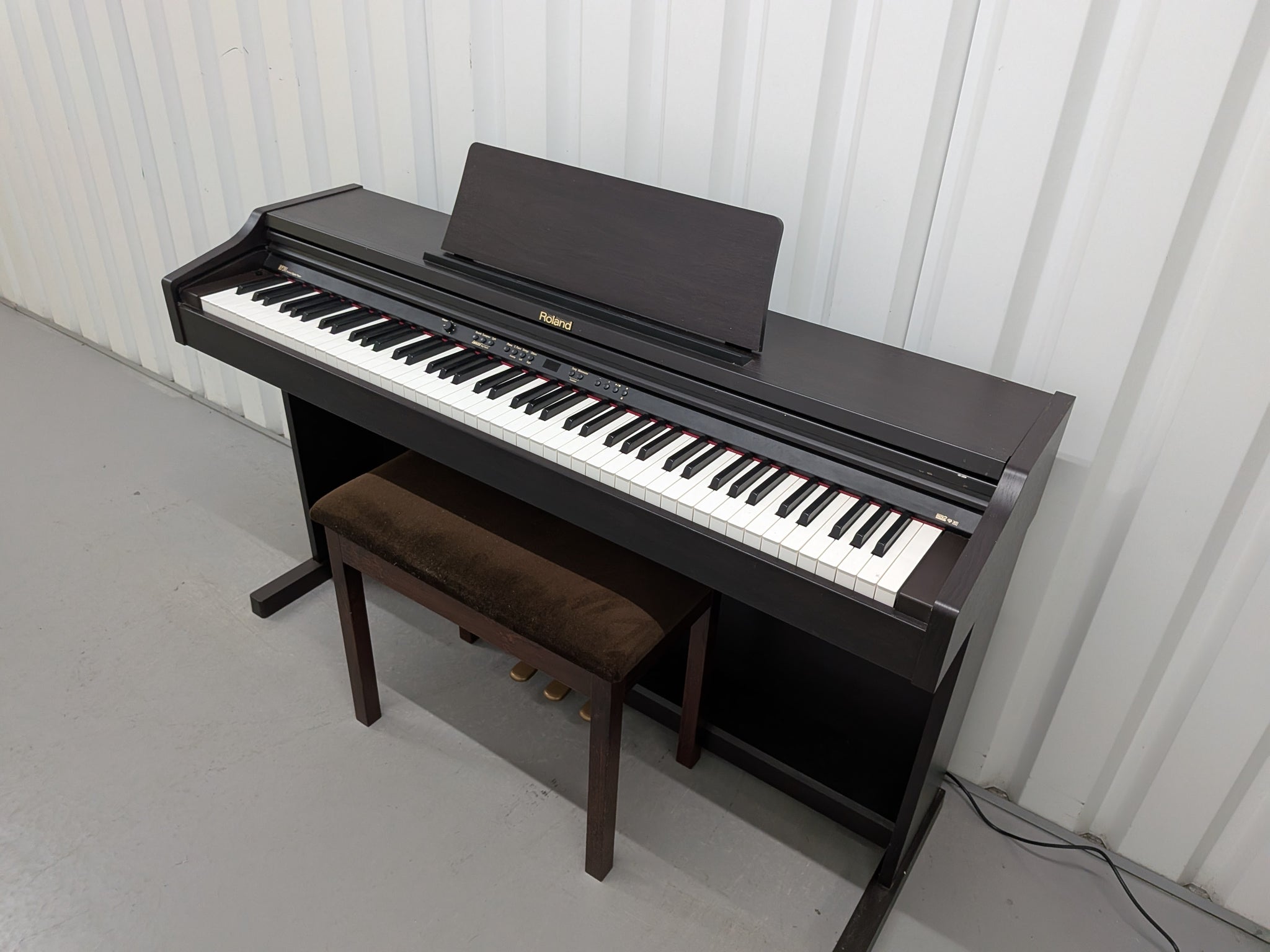 Roland RP201 Digital Piano and stool in dark rosewood finish Stock