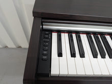 Load image into Gallery viewer, Yamaha Arius YDP-142 Digital Piano and stool in dark rosewood stock #25487
