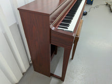 Load image into Gallery viewer, Yamaha Clavinova CLP-535 in mahogany with matching stool stock nr 25486
