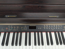 Load image into Gallery viewer, Yamaha Clavinova CLP-240 Digital Piano and stool in dark rosewood stock nr 25500
