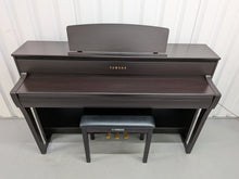 Load image into Gallery viewer, Yamaha Clavinova  CLP-775 and stool in dark rosewood stock #25513
