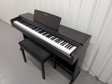 Load image into Gallery viewer, Yamaha Arius YDP-143 Digital Piano and stool in dark rosewood stock #25535
