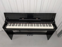 Load image into Gallery viewer, Roland DP-990r digital slim line space saving piano in polished ebony black stock # 25516
