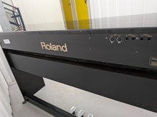 Load image into Gallery viewer, Roland DP-990r digital slim line space saving piano in polished ebony black stock # 25516
