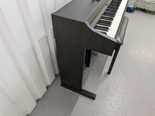Load image into Gallery viewer, Roland RP301 digital piano and stool in dark rosewood finish stock number 25540

