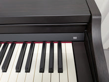 Load image into Gallery viewer, Roland RP301 digital piano and stool in dark rosewood finish stock number 25540
