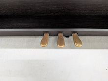 Load image into Gallery viewer, Roland RP301 digital piano and stool in dark rosewood finish stock number 25540
